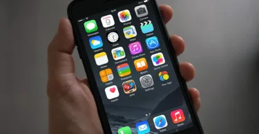 iPhone in Hand App Icon Mockup Free PSD